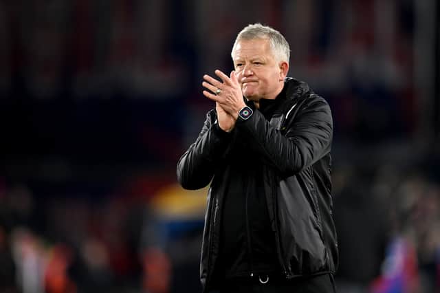 Chris Wilder applauds the travelling fans at Palace