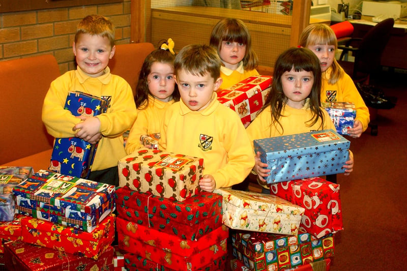A big cheer for these pupils who donated gifts to the shoebox appeal at the school in Operation Christmas Child in 2004.