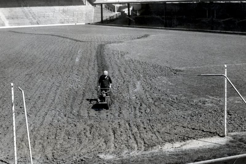Behind the scenes at Bloomfield Road preparing for the season in 1961. The pitch is being ploughed ready for levelling and reseeding