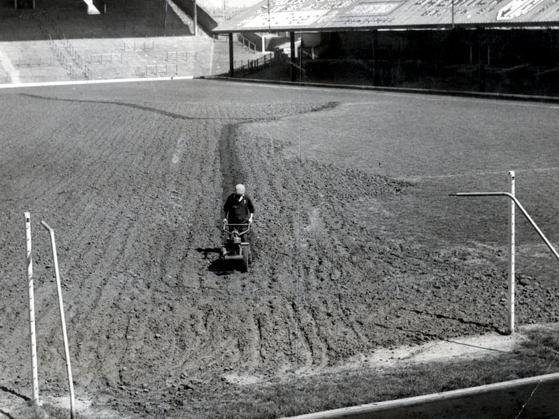 Behind the scenes at Bloomfield Road preparing for the season in 1961. The pitch is being ploughed ready for levelling and reseeding