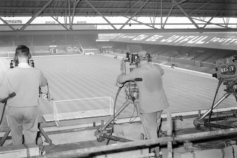Television cameras in operation at the back of Spion Cop, Bloomfield Road,  where for the first time a Football League match was being filmed for broadcasting the same evening