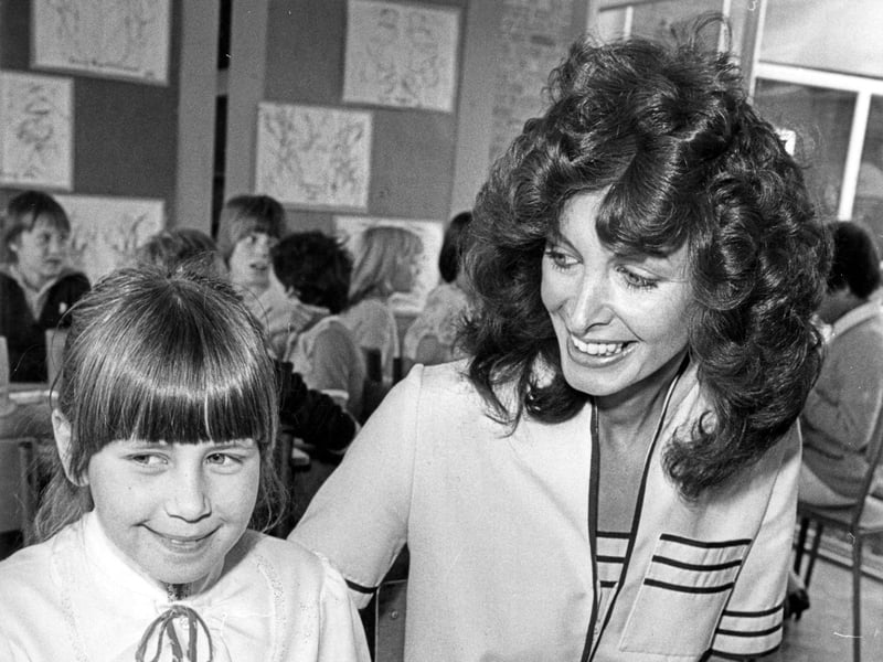 Marti Caine (pictured here at Lowedges Junior School with pupil Tina Wild) was born and raised in Sheffield, where she began performing at Chapeltown Working Men's Club. She went on to become one of the nation's best-known comedians, singers and actors after winning the TV talent show New Faces in 1975. Her acting roles included the 1984 BBC sitcom Hilary, which was written specifically for her.