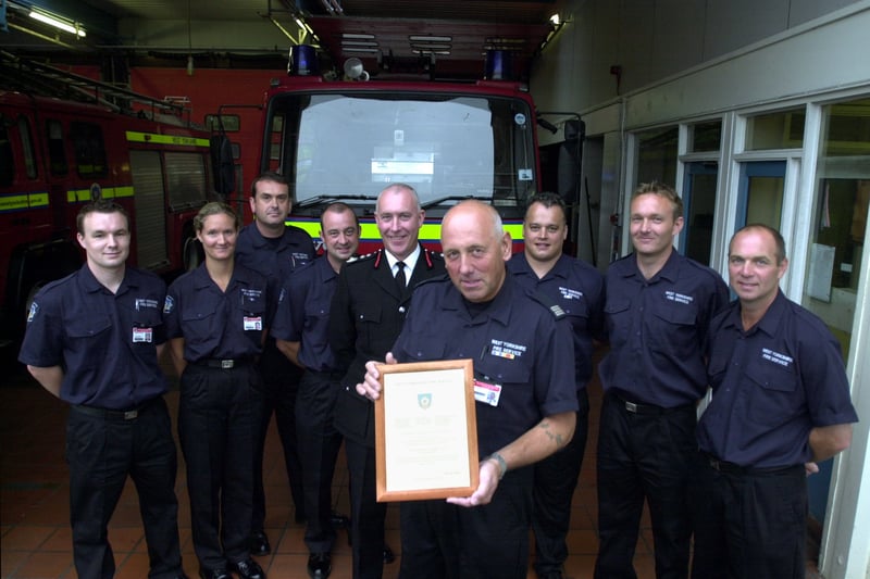 Sub officer Ian Greenup, pictured after receiving the Chief Fire Officer's Commendation Award on behalf of Blue Watch from Chief Fire Officer Phil Toase, at Hunslet Fire Station. He is watched by other members of Blue Watch, from left, Matthew Bowden, Sophie Gibson, Steven Kirton, Dave Pygott, Chris Atkinson, Mark Bland and David Atkinson.