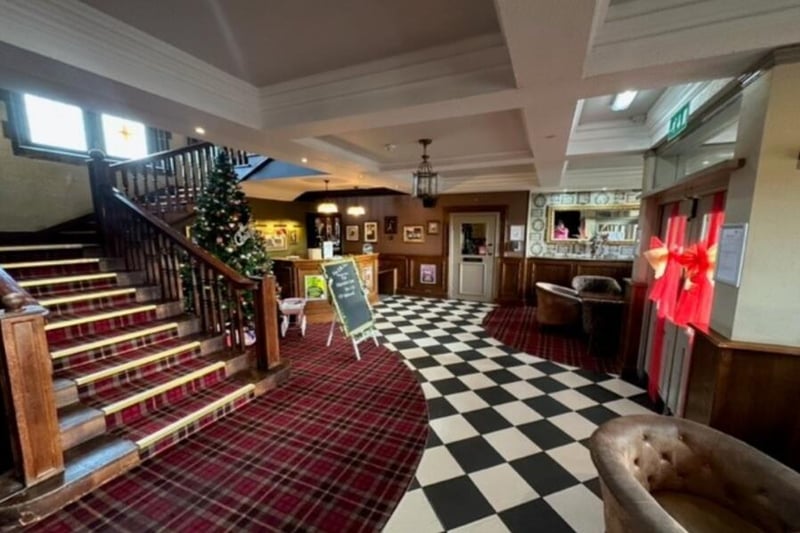 Visitors to the Marsden Inn are greeted by a grand looking reception area, with stairs leading up to nine en-suite rooms.