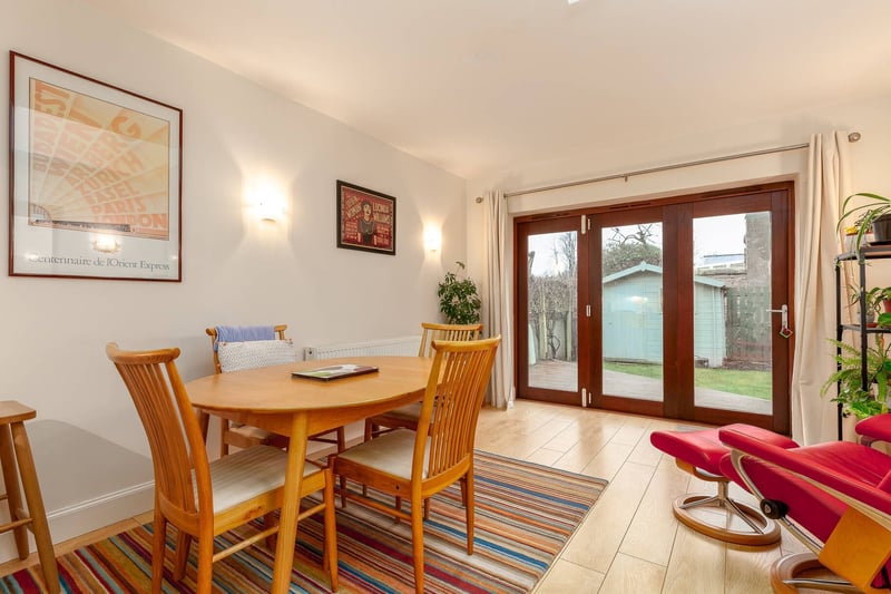 There is open access to the extended dining room/sitting room. With bi-fold doors to rear garden