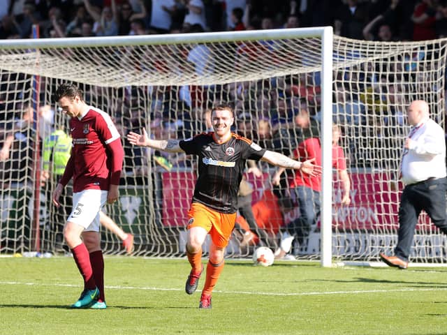 Sheffield United's John Fleck celebrates scoring his side second goal during the League One match at the Sixfields Stadium, Northampton which helped secure promotion from League One. Pic David Klein/Sportimage 
