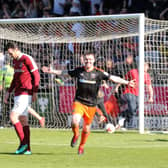 Sheffield United's John Fleck celebrates scoring his side second goal during the League One match at the Sixfields Stadium, Northampton which helped secure promotion from League One. Pic David Klein/Sportimage 