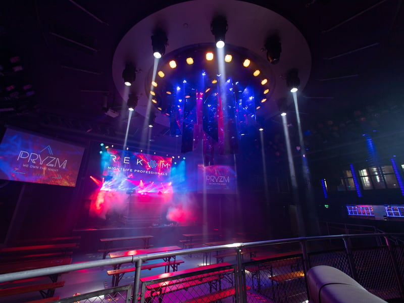 Lights flood the dancefloor