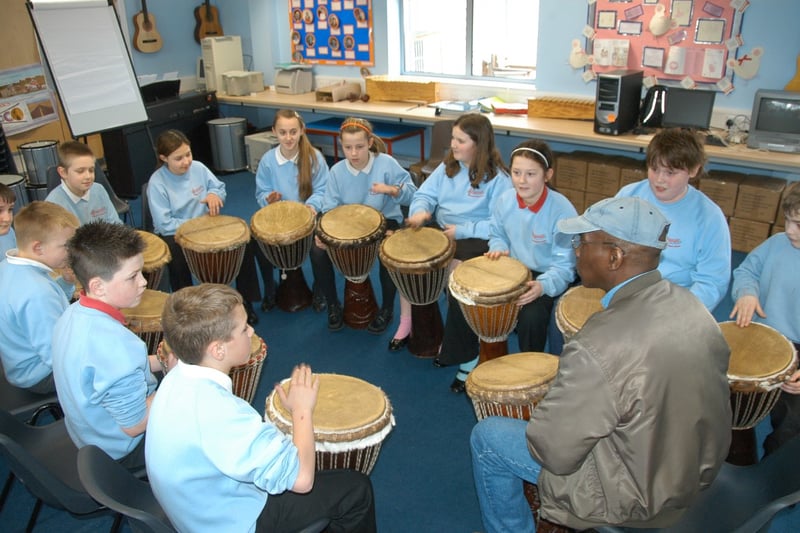 Having fun at a drum workshop.
Teacher Mervyn Thomas was instructing Year 6 pupils in this session from March 2009.