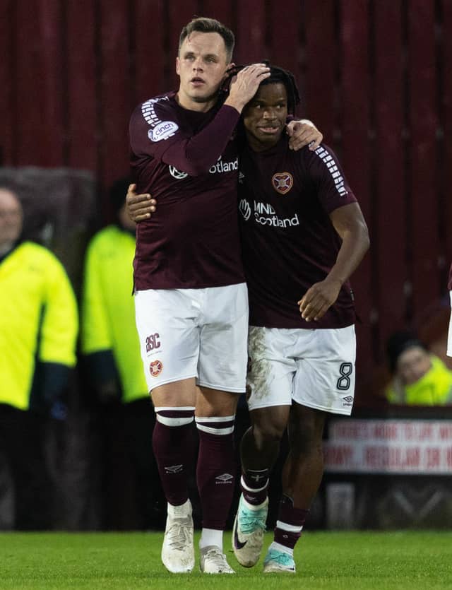 Lawrence Shankland and Dexter Lembikisa celebrate the new loan star's first goal.