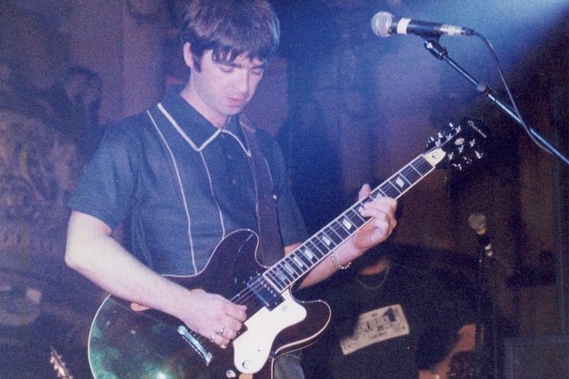 Noel Gallagher on stage in 1995 at the Empress Ballroom