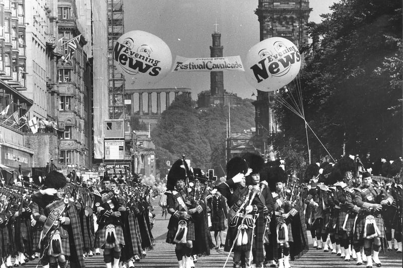 Pipers march along Princes Street during the Edinburgh Festival Cavalcade procession of 1984.
