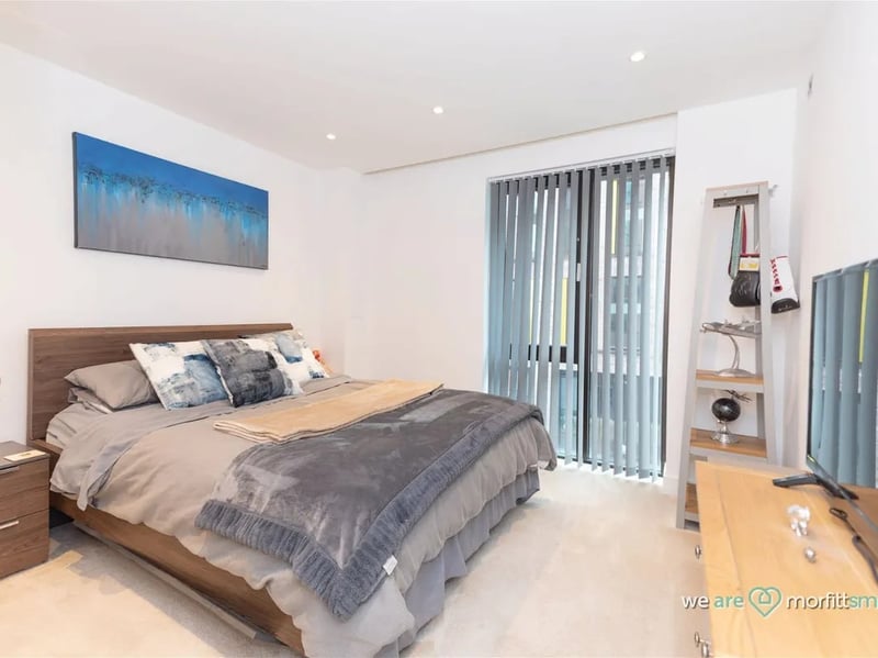 There are two bedrooms in the apartment. This is the master. (Photo courtesy of Zoopla)