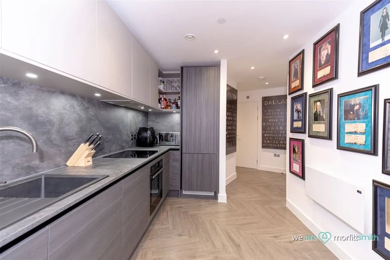 The modern kitchen features plenty of storage and a range of appliances. (Photo courtesy of Zoopla)