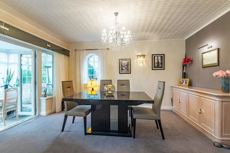 The dining room fits a large dining table making it the ideal place to gather family and friends.