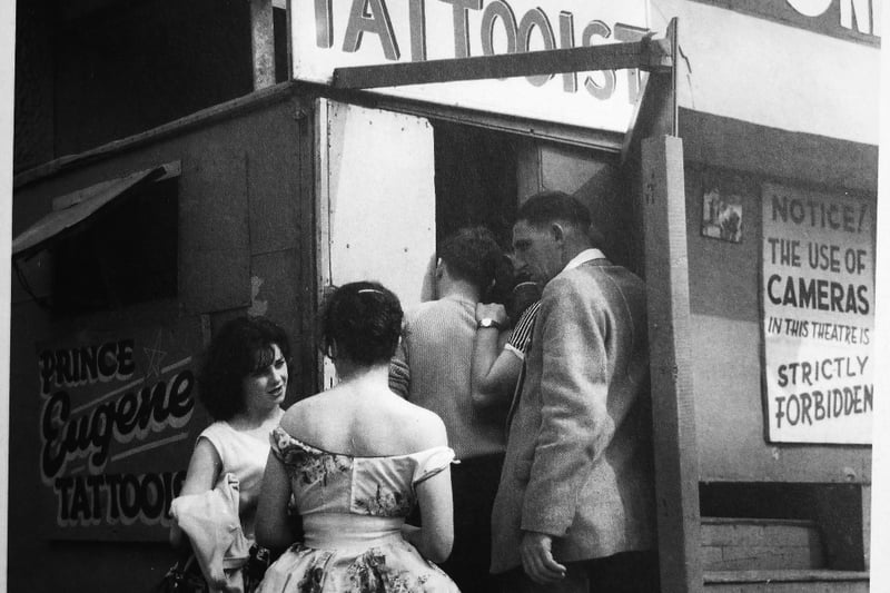 Queuing up for a tattoo on the Golden Mile in the 1960s