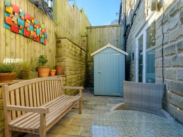 The house comes with this lovely courtyard space. (Photo courtesy of Whitehornes)