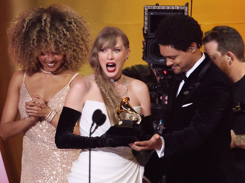 Taylor Swift accepts the "Best Pop Vocal Album" award. During her speech she announced her 11th studio album. 