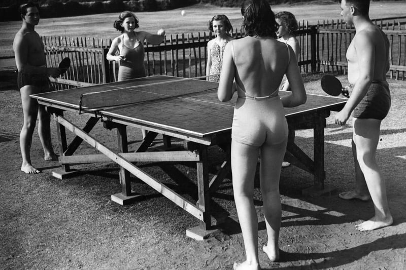 5th June 1939: Holidaymakers in the Marine Gardens, Fleetwood, enjoying a game of table tennis