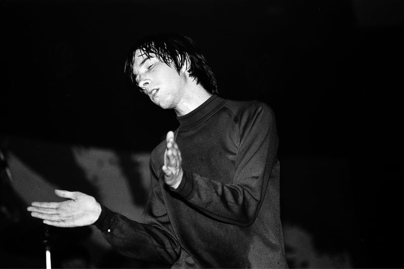 Bobby Gillespie of Primal Scream performs on stage at Barrowlands in October 1991. 