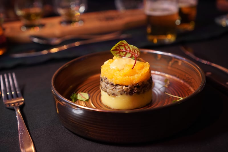 Haggis, Neeps, and Tatties layered and presented beautifully. The ratios are perfect and allow for the all-Scottish taste pairing on the palate.