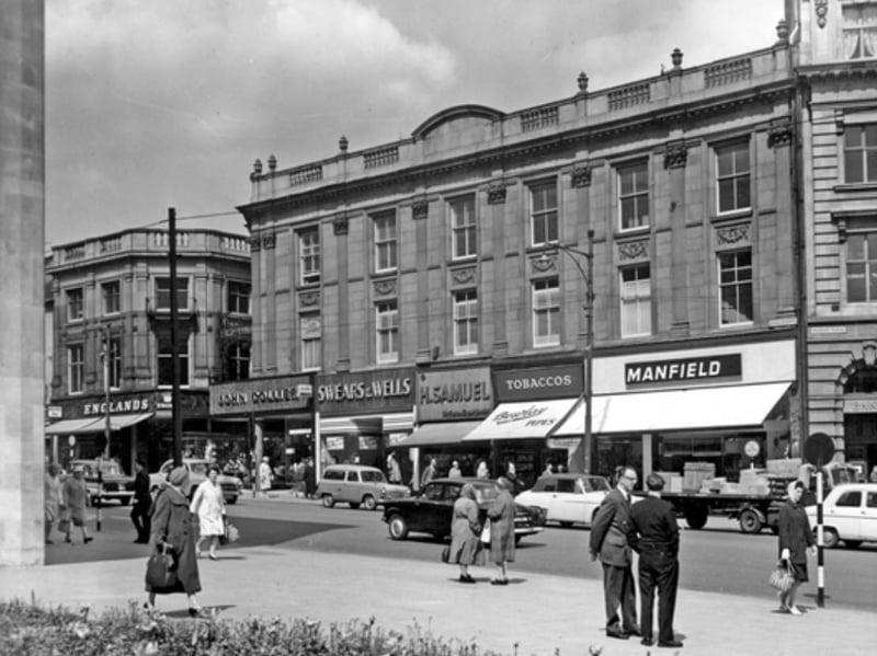 High Street, Sheffield city centre, in 1965, showing John Collier (Prices Tailors Ltd) tailors, Swears and Wells furriers, H. Samuel jewellers, Bewlay (Tobacconists), and Manfield and Sons shoe shop