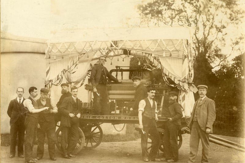 An old parade float representing Airdrie Cotton Works