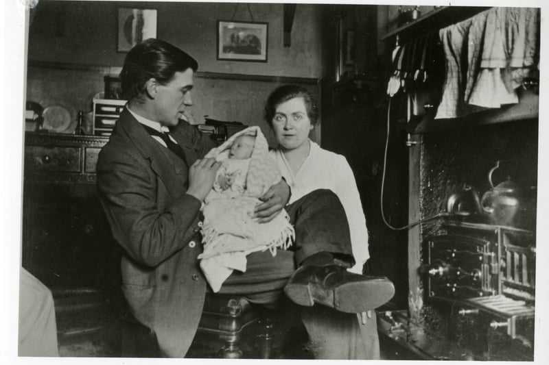 Photograph of James Hamilton and his wife Mary Watson with baby Isobel Hamilton at their home at 108 Alexander Street.