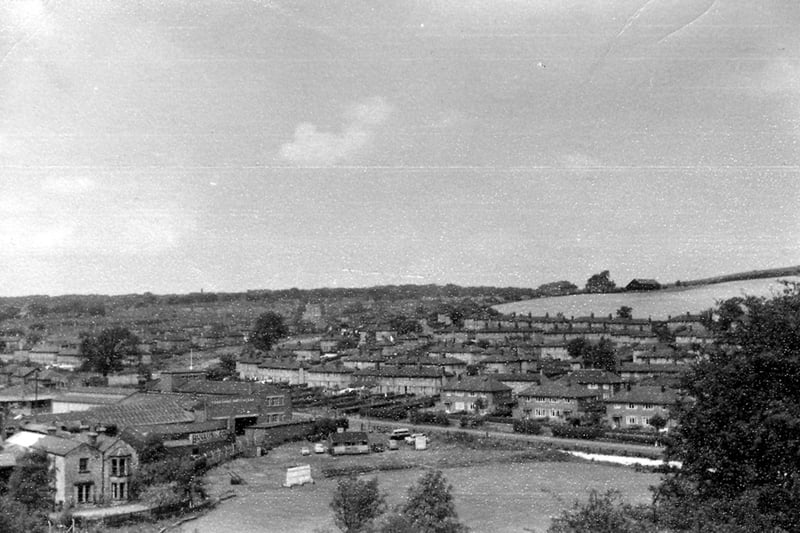 This photo was  taken from a viewpoint on Woodhouse Ridge over the Farm Hill Estate. The Yorkshire Switchgear factory is seen at the bottom left with Woodhouse County Cricket Ground in the foreground. Meanwood Road runs along the edge of the cricket ground.  Pictured in August 1959.

