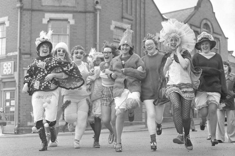 Women customers of the Grey Horse pub staged their annual race round the local streets in April 1975.