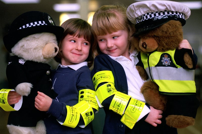 January 2000 and pupils from Kippax North Primary wearing some of the new florescent road safety armbands given to the school. Pictured are Abbie Wills and Rachael Corrigan.