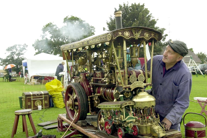 Kippax's Arthur Boothroyd with his home made  'Empress of Kippax'  miniature showmans engine a quarter size of the original. He finished it  in 1987 made from scrap metal and other odds and ends. He is pictured displaying it at Ledsham Fayre in September 2000.