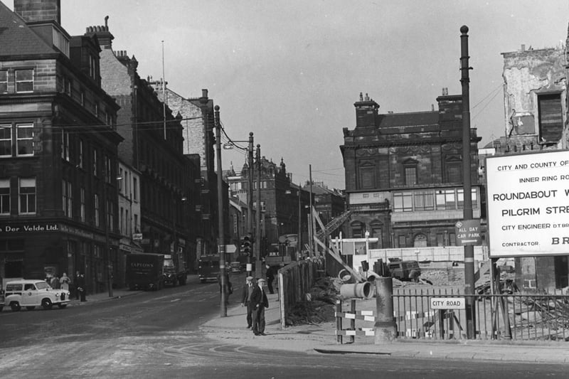 A 1964 view of Pilgrim street looking north from City road. Engineering works can be seen on the right side for what is now the Swan House roundabout. Van de Velde. Ltd. can be seen on the left.