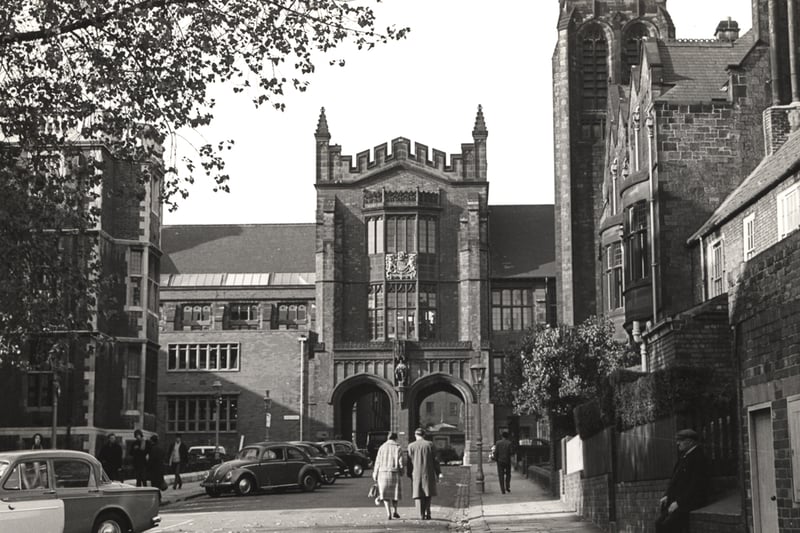 A view of King's Walk University of Newcastle upon Tyne Newcastle upon Tyne taken in 1964. The photograph is looking along King's Walk towards the Arches and the Quadrangle. The Students Union is in the foreground to the left and houses and a church to the right. The Department of Archaeology and the Museum of Antiquities are to the left of the Arches and the Department of Fine Art to the right. The Percy Building can be seen in the background through the right arch.