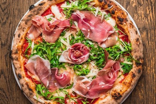 Oi Vita Pizzeria is a relaxed restaurant in Inslington, London, where customers can feast on Neapolitan-style specialty pizzas, including plant-based varieties. According to one Google reviewer, "If you search for a real Italian pizza you must visit this place." Photo by Oi Vita.