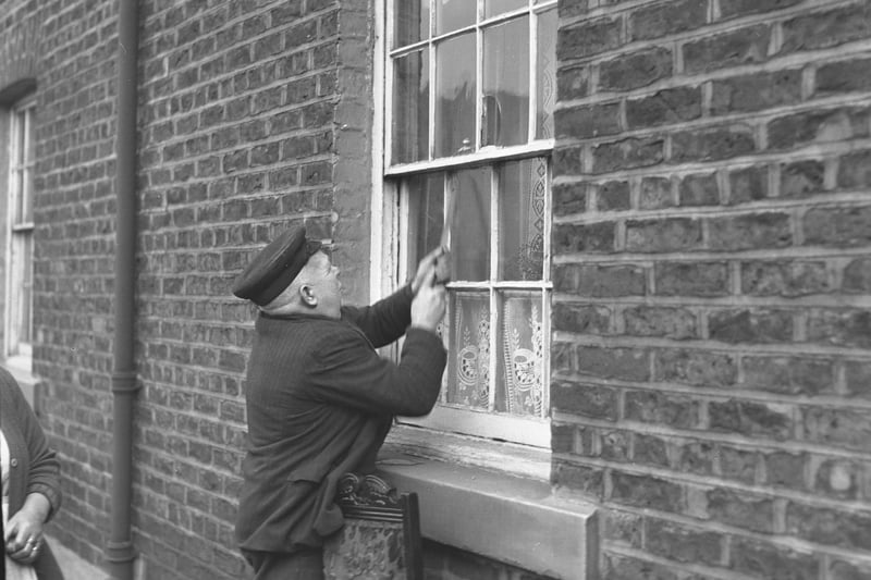 Hard at work on a property in Trafalgar Square in 1939.