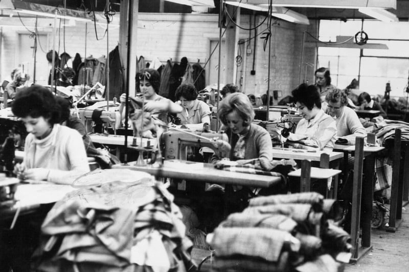 Making skirts at A. Riddell and Co. Ltd. wholesale gown and mantle manufacturers in January 1964.