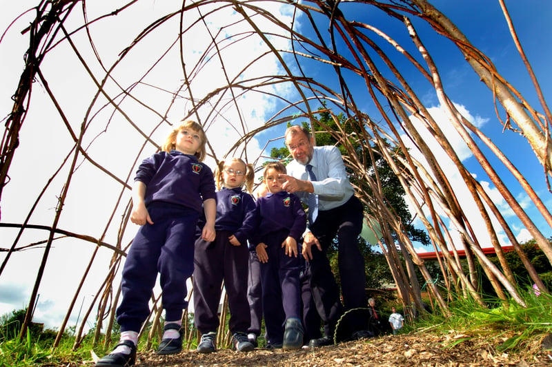 John Battle MP with pupils from Christ the King R.C. Primary School in a new outdoor classroom which he officially opened. Pictured in July 2007.
