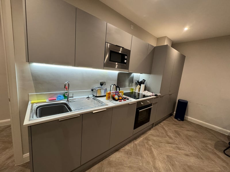 It has a swanky kitchen area, perfect for whipping up a delicious meal 