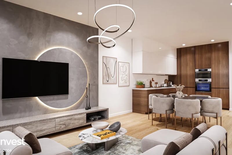 Features of the apartments include high-gloss kitchens with integrated appliances, large windows, and double doors that open onto private balconies