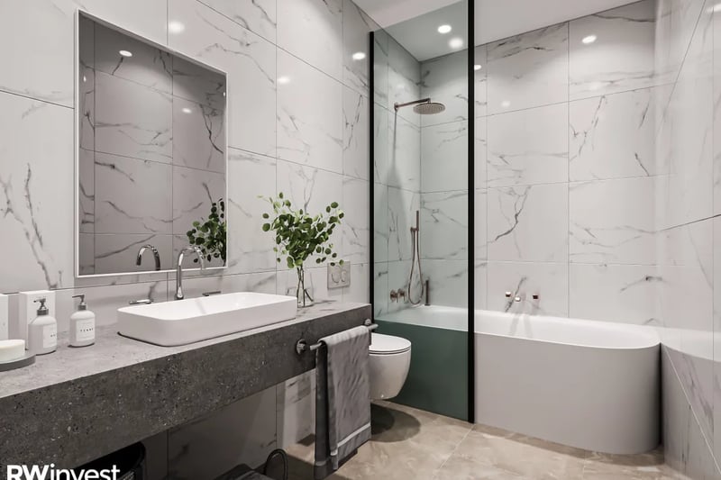 The bathroom has a modern design. The flat is just 680m from the nearest train station, with easy links to nearby shopping centres, bars and restaurants