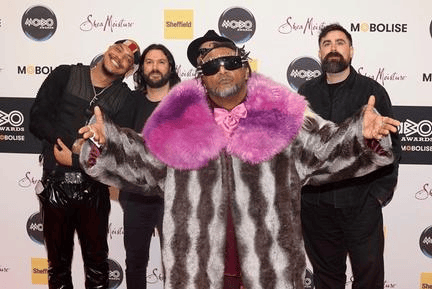 Skindred with Kid Bookie (left) on the red carpet.