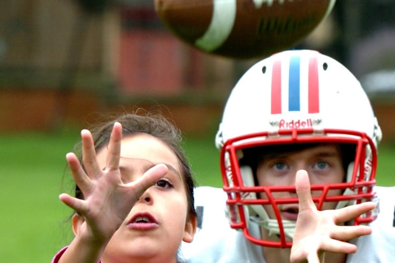 Eyes on the ball during a practice session with Scott Hammond from Durham based DC Presidents American Football team.
The training session was held at Sunderland High School, in August 2012.