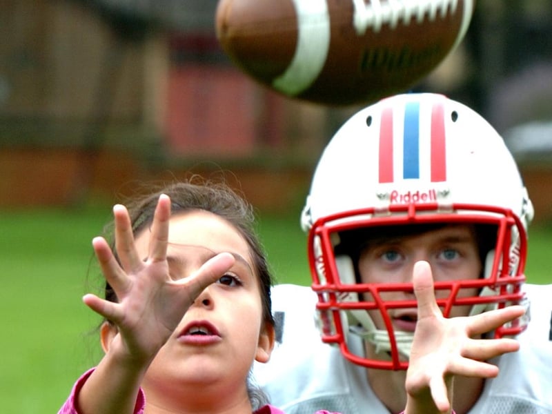 Eyes on the ball during a practice session with Scott Hammond from Durham based DC Presidents American Football team.
The training session was held at Sunderland High School, in August 2012.