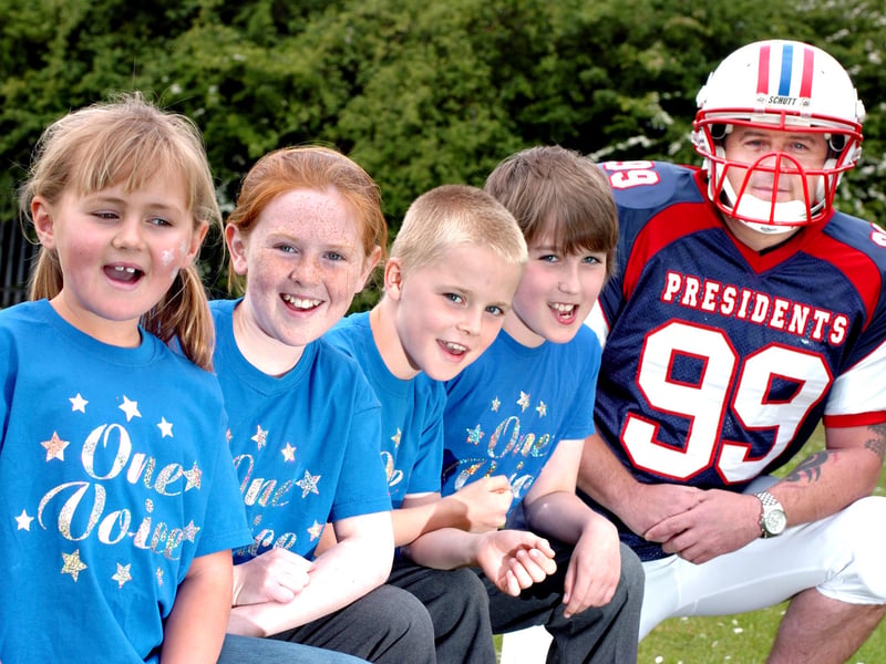Megan Gray, 10, Ewan Pinder, 9, Craig Fergus, 10, and Leah Smith, 8, got to meet Lee Lamb from the DC Presidents American football club in this photo from 2011.
The youngsters were all members of the One Voice choir at Holley Park Primary School, Washington. 