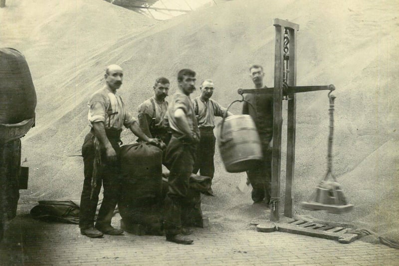 Another scene from Meadowside Granary, the workers had literal mountains of labour to complete each day shifting grain. Note the moustaches, we don't think they'd look too out of place in Partick today!