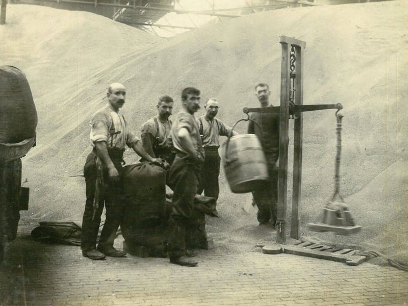 Another scene from Meadowside Granary, the workers had literal mountains of labour to complete each day shifting grain. Note the moustaches, we don't think they'd look too out of place in Partick today!