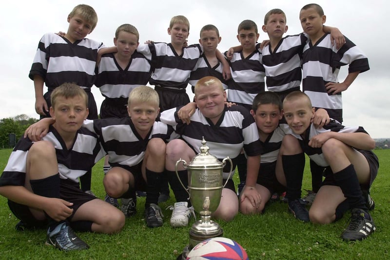 It's the winning Kippax U-10s rugby team pictured in July 2003.