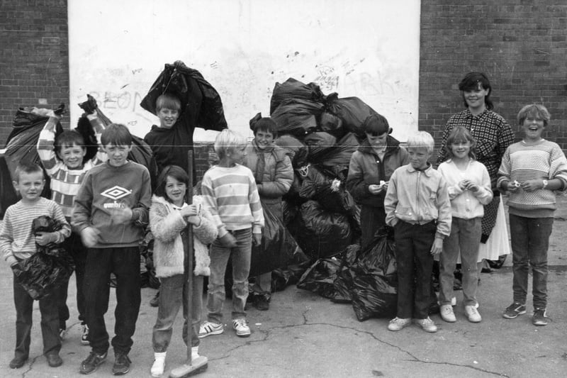 Children of South Gipton taking part in a clean-up campaign on the estate in November 1987. It was a project instigated by the Gipton Community Refurbishment Scheme and the children were involved as part of a holiday play project. The children filled more than 60 sacks with rubbish and were provided with refreshments by sponsors, Kentucky Fried Chicken. The youngsters were hoping to win a prize in the National Clean-up competition organised by the Keep Britain Tidy Campaign.