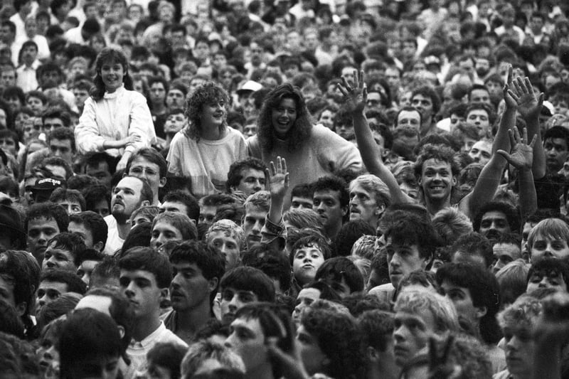 Revellers enjoy the Genesis concert in July 1987.